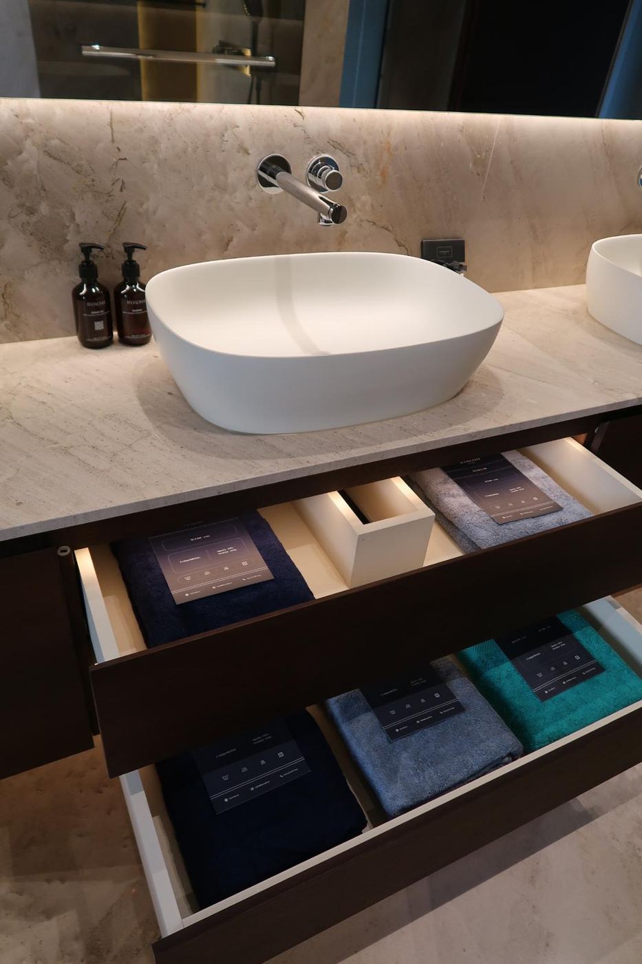 BYROSH towels in a hotel bathroom vanity